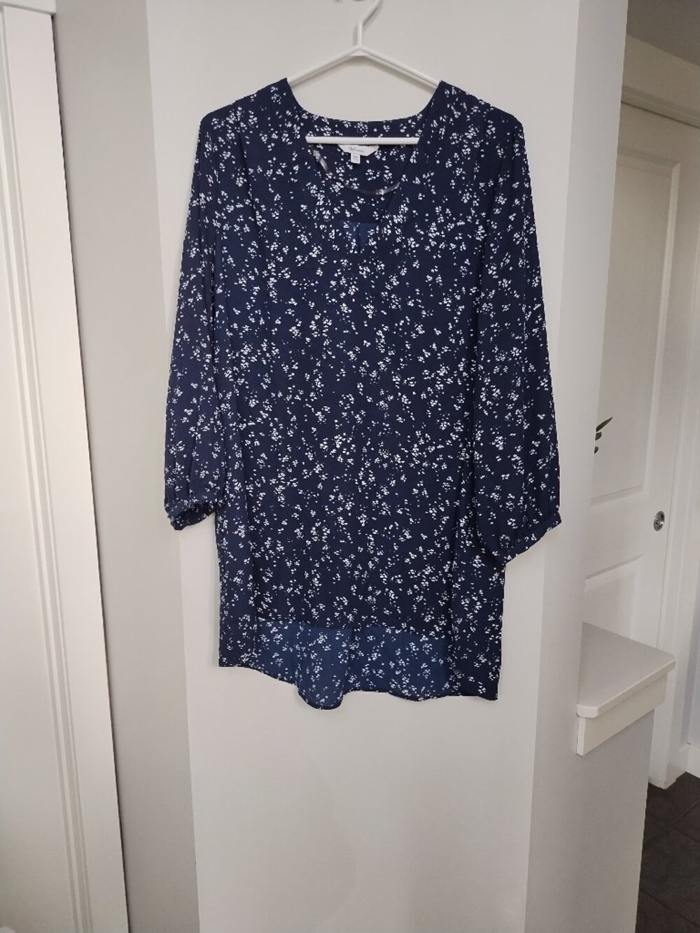 Navy/white sheer long sleeve pullover tunic from Reitmans